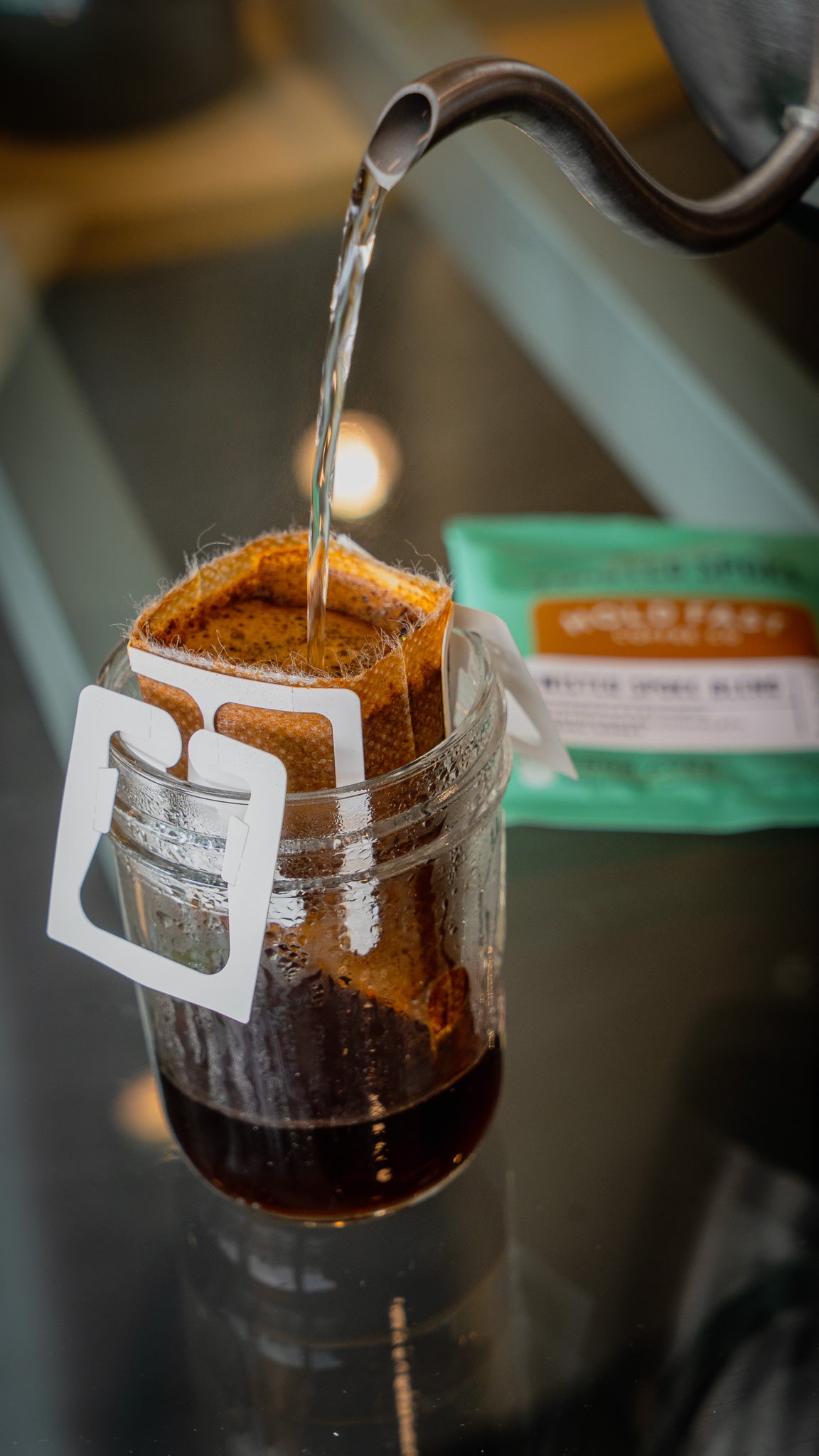 Image of water being poured over coffee